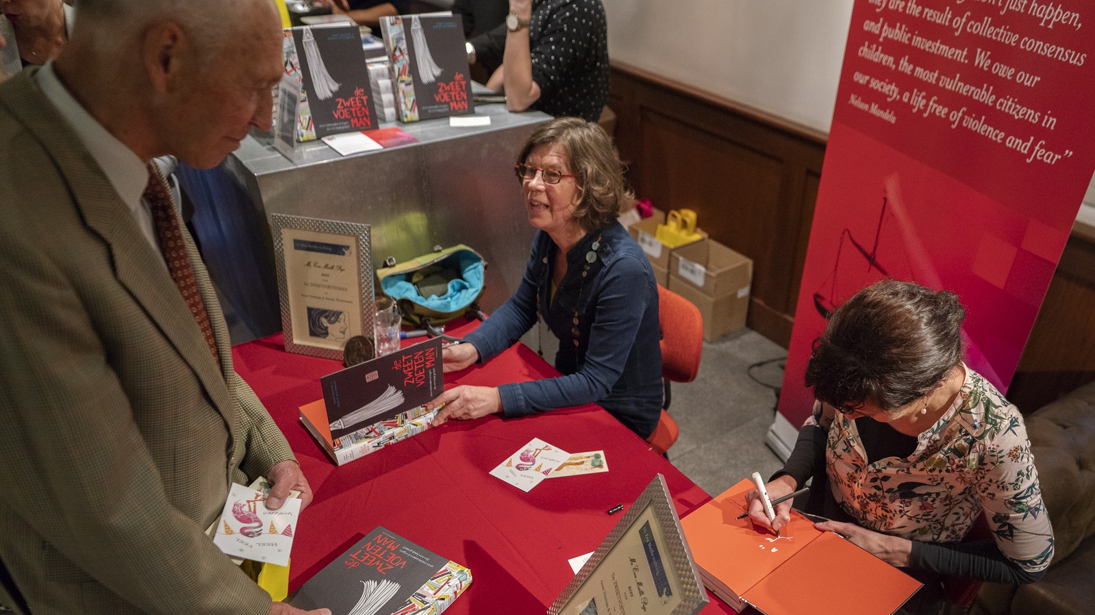 SSR Meillo-lezing 2018 Rode Hoed signeersessie zweetvoetenman